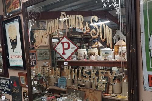 Rare advertising signs, framed mirrors and bar stools at pub memorabilia sale 