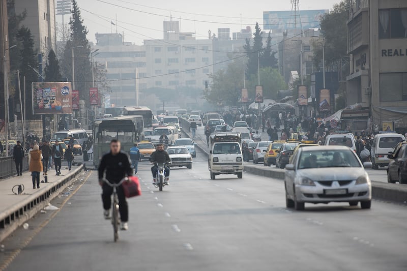 Vehicles on a street in Damascus on Monday after Syria's military operations administration announced the lifting of a curfew on Wednesday. Photograph: Hasan Belal/EPA-EFE