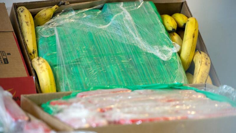 A banana box with packets of seized cocaine are on display at the State Office of Criminal Investigations in Berlin after employees of an ALDI discount supermarket in Berlin found packets hidden inside banana boxes from Colombia.