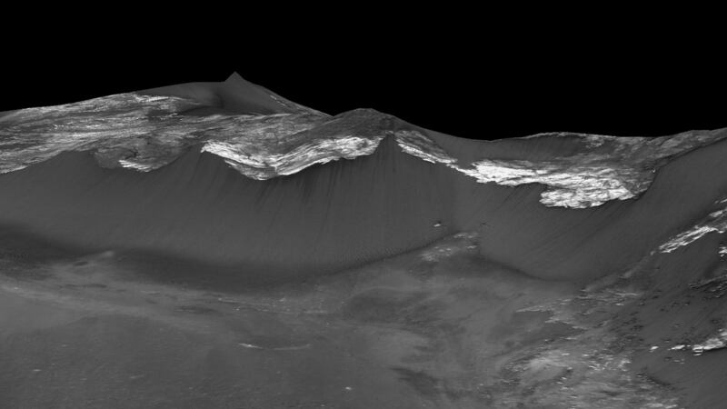 Satellite images have identified narrow streaks, typically less than five metres  wide, that appear on slopes during warm seasons, lengthen, and then fade when conditions become cooler. Photograph: PA