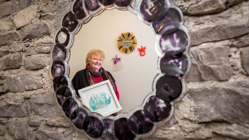 Glass artist Kathleen Leadbetter of Jerpoint Glass Studio in Co Kilkenny pictured with some of her works.