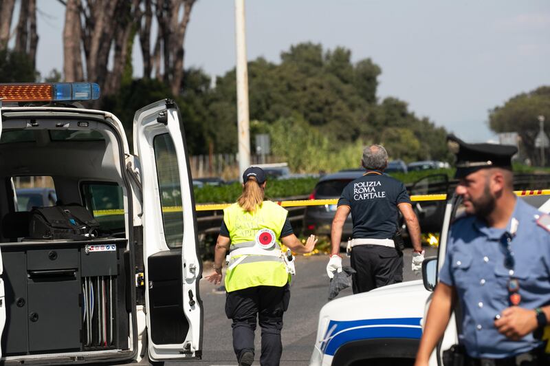 Police and emergency workers attend the scene. Photograph: Emanuele Valeri/ANSA via ZUMA Press/Shutterstock