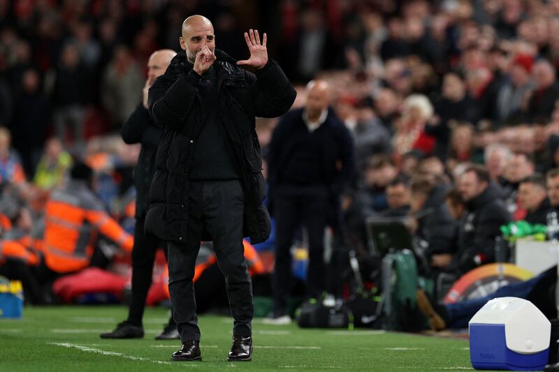 Manchester City manager Pep Guardiola reacts to jeering from Liverpool fans at Anfield. Photograph: Adrian Dennis/AFP via Getty Images