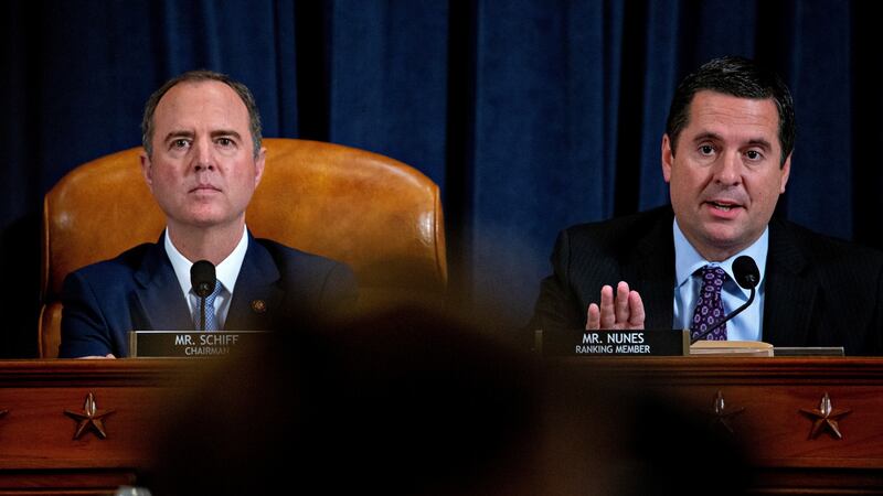 Democratic House intelligence committee chairman Adam Schiff and Devin Nunes, the senior Republican on the committee, during Thursday’s impeachment inquiry hearing. Photograph:   Andrew Harrer/Pool via Reuters