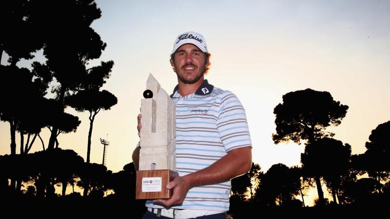 Brooks Koepka of the USA   with the trophy after winning the final round of the 2014 Turkish Airlines Open at The Montgomerie Maxx Royal   in Antalya.  Photograph:  Ian Walton/Getty Images