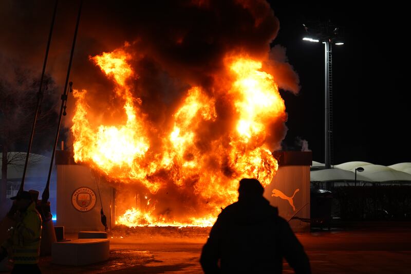 A fire at a merchandise kiosk outside the Etihad Stadium ahead of Man City's Champions League game against Club Brugge: Martin Rickett/PA