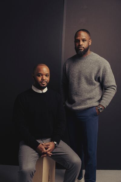 Aaron and Andre Eanes, who signed Travis Kelce to their management company when all three of them were still in college. Photograph: Amir Hamja/The New York Times
                      