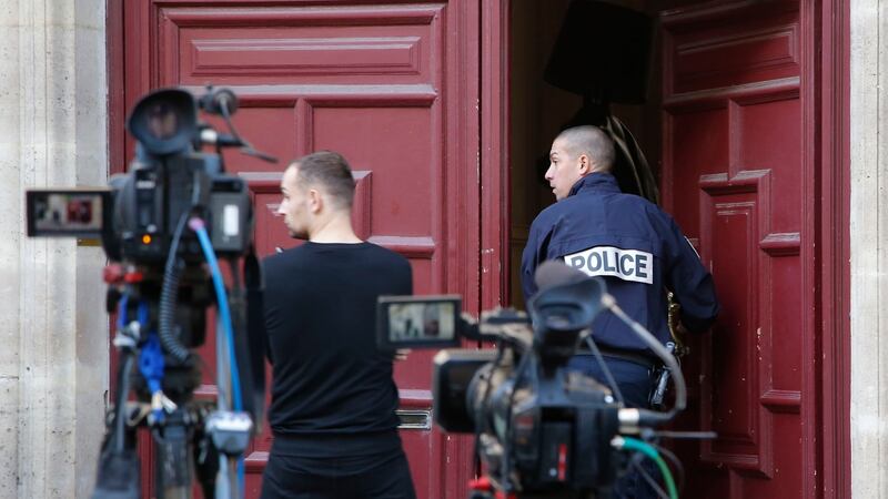 Kardashian jewellery raid:  French police at the Paris building where Kim Kardashian was robbed at gunpoint of gems worth €9 million. Photograph: Michel Euler/AP