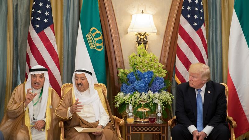 US president Donald Trump during a meeting with the Emir of Kuwait, Jaber Al-Ahmad Al-Sabah, with his interpreter, left, in Riyadh, Saudi Arabia, May 21st, 2017. Photograph: Stephen Crowley/The New York Times