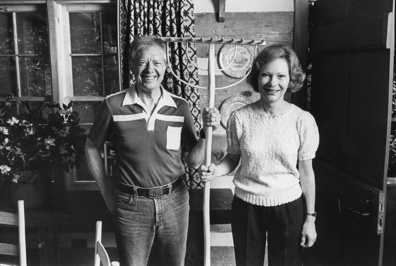 Former president Jimmy Carter and his wife, Rosalynn, at their cabin in Ellijay in August 1983. Photograph: Fred R. Conrad/The New York Times
                      