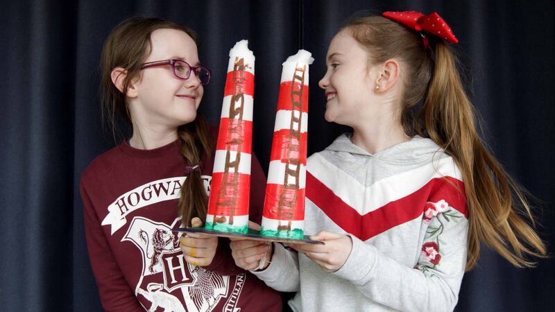 Sisters Grace (11)  and Fraoch McSweeney (10) from Cabra, Dublin with  part of the model they made during a workshop on designing a Dublin for young people.  Photograph: Mark Stedman.