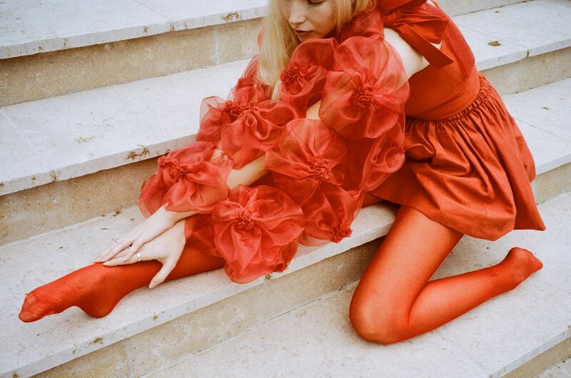 Red floral organza bolero (€700, made to order), red organic cotton jersey top with bow details (€90), red cotton skirt with elasticated waist (€80)