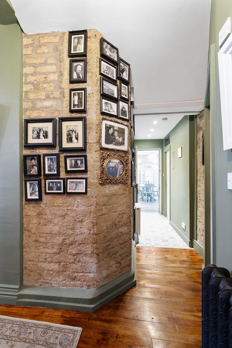 The hall with exposed original brickwork