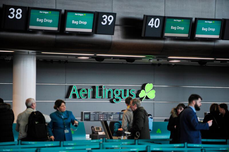 Customers wait to drop their luggage at Aer Lingus check-in desks. Photograph: Aidan Crawley/Bloomberg