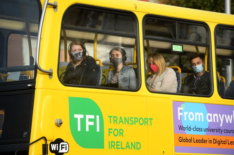 Face masks on public transport in Dublin. Photograph: Dara Mac Dónaill