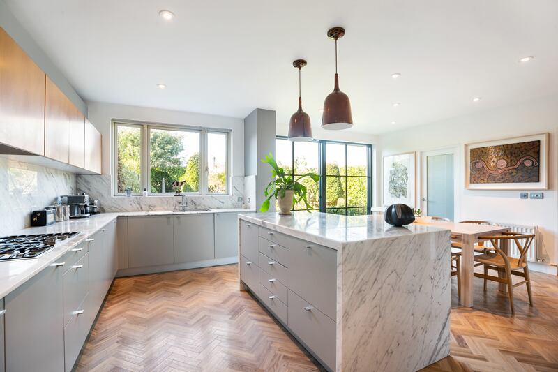 The property has a Dada kitchen with Italian walnut units and new Carrara marble tops