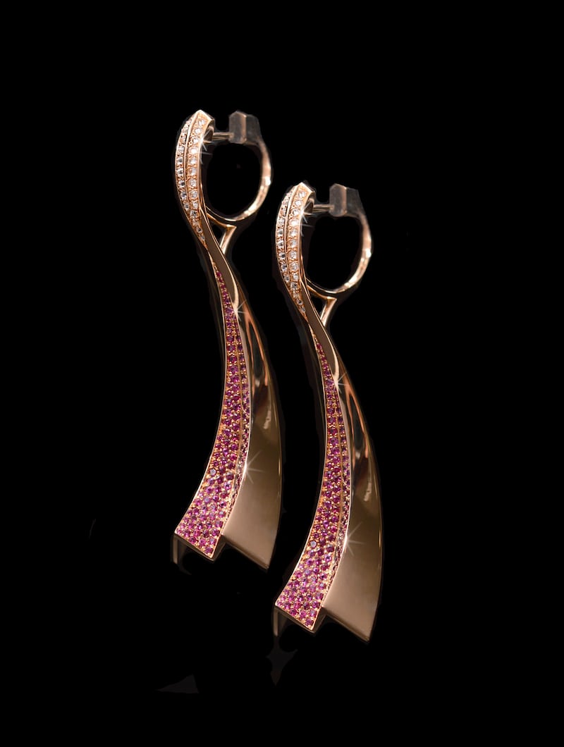 Hinged 18k rose gold Comet earringsset with rubies and diamonds, by Nigel O’Reilly