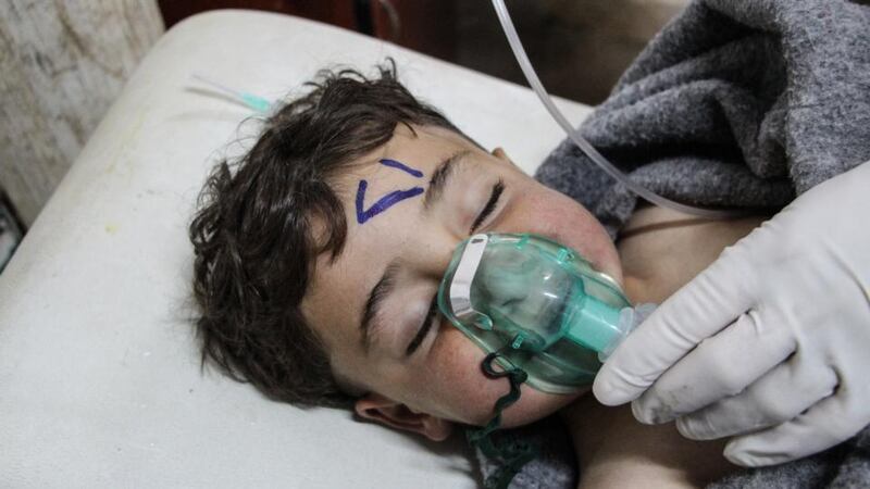 Chemical attack: a Syrian child is treatmed after Bashar al-Assad’s regime apparently used nerve gas on civilians. Photograph: EPA Chemical attack: a Syrian child is treatmed after Bashar al-Assad’s regime apparently used nerve gas on civilians. Photograph: EPA