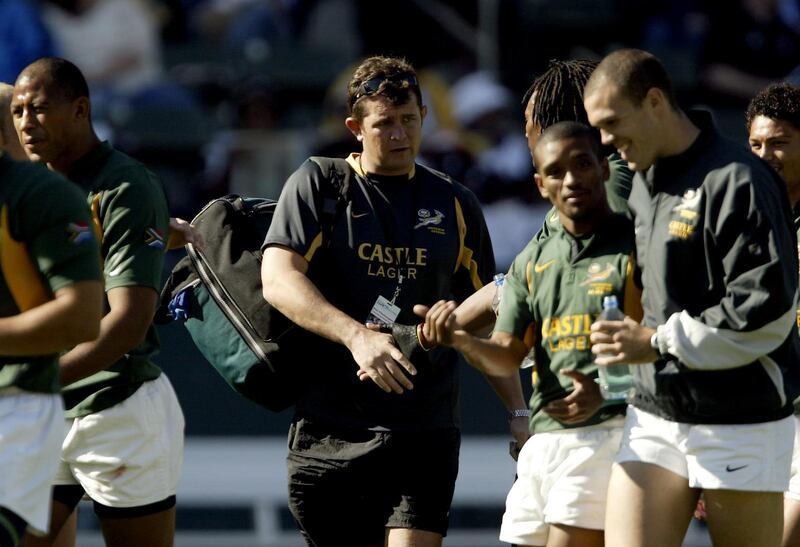 South Africa coach Dion O'Cuinneagain with his team after Uruguay were defeated 59-0 in the IRB Rugby USA Seven Series in 2004 in Carson, California. File photograph: Getty Images