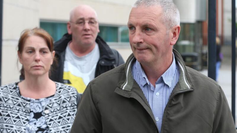 Suzanna, Thomas (Tucker) and Michael McConville leaving Belfast Laganside Court, where Ivor Bell faced counts of aiding and abetting the killing of their mother Jean McConville and of IRA membership. Photograph: Niall Carson/PA Wire