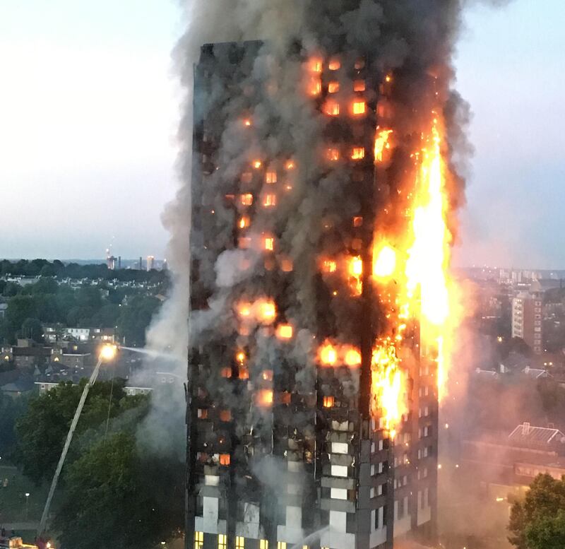 The Grenfell Tower in west London on fire on Wednesday in which at least 17 people have died and 70 are missing.  Photograph: PA