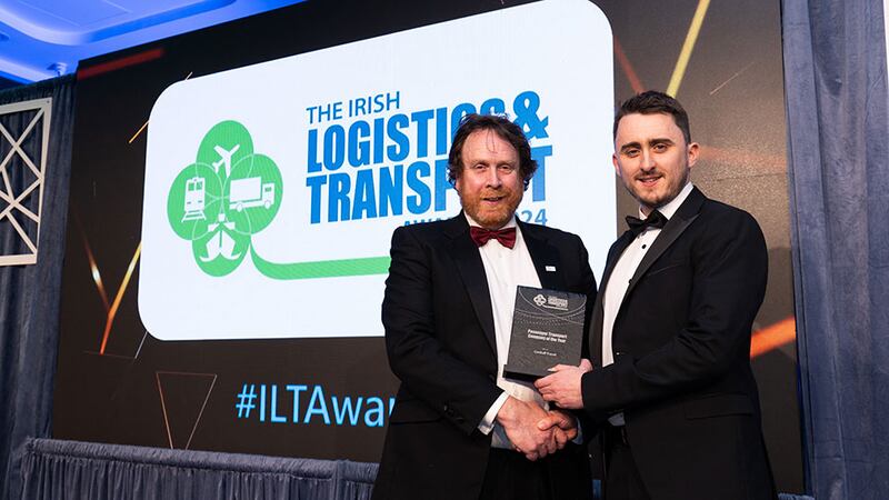 Declan Allen, head of logistics, supply chain and project management of Technological University Dublin presents the passenger transport company of the Year award to Michael Corduff, Corduff Travel