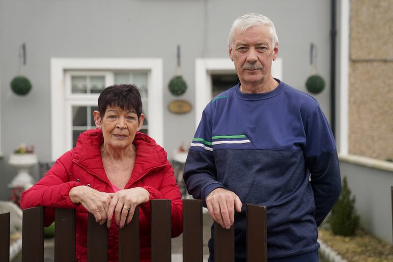 Tim and Catherine Crosgrove, who are residents of St Bernard's Place in Fermoy, Co Cork, watched as Tina Satchwell's funeral cortege passed through their hometown. Photograph: Brian Lawless/PA Wire