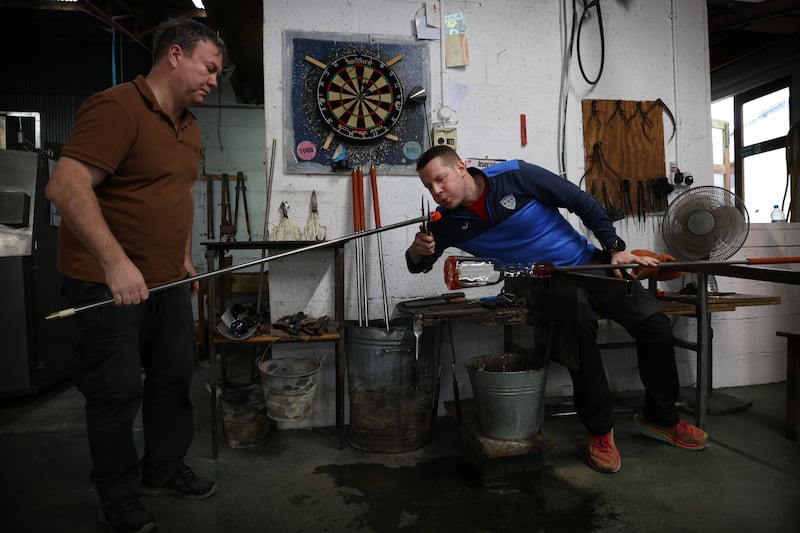 Johnny Maher (left) and Rory Leadbetter at work in Jerpoint Glass Studio. 