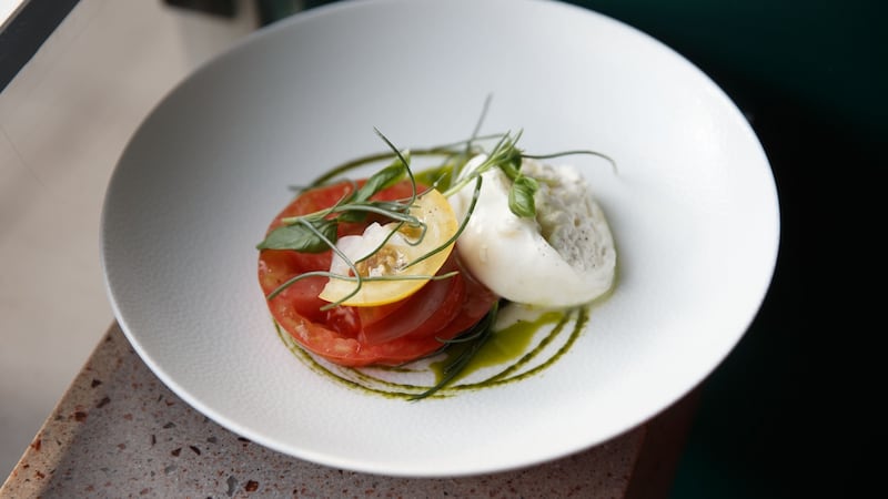 Burrata, heilooom tomatoes and pickled onion