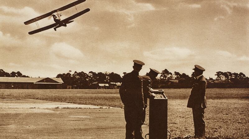 A pilotless airplane “Queen Bee” with the the wireless controlling-apparatus in the foreground. Photograph: The Illustrated London News