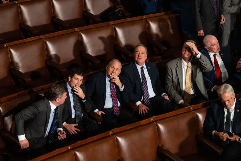 Members of the House of Representatives look up at a board of votes during a meeting of the 118th Congress. Photograph: Eric Lee/Bloomberg