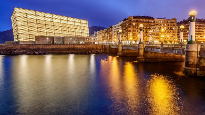 Puente del Kursaal (bridge) over the river Urumea, with the Kursaal congress centre and auditorium lit in the background. Photograph: Getty Images