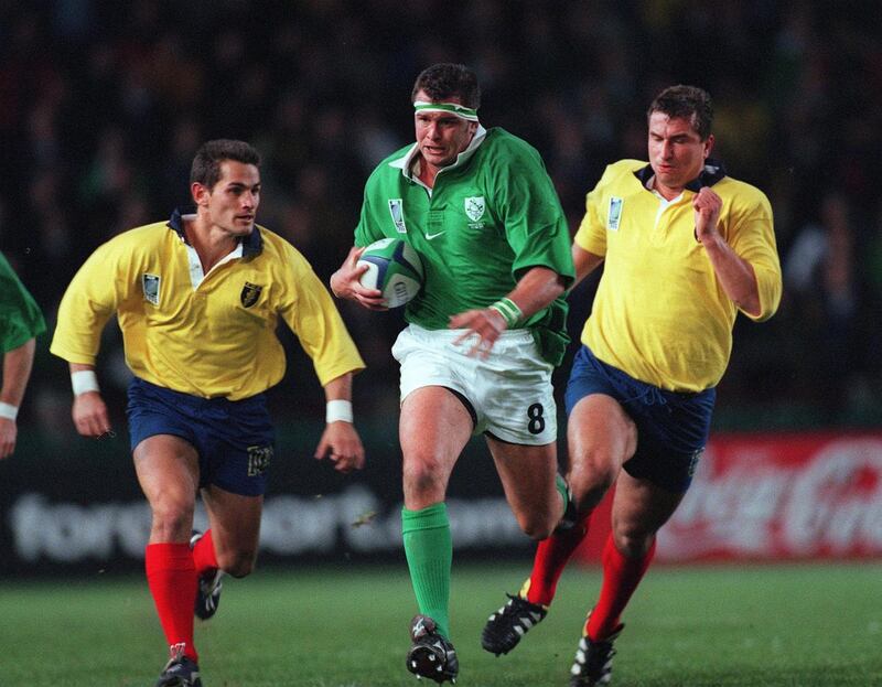 Ireland's Dion O'Cuinneagain on the charge. Photograph: Billy Stickland/Inpho