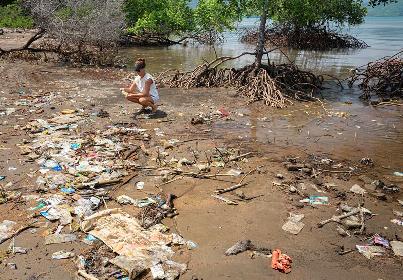 Kate Ashe-Leonard with plastic packaging debris