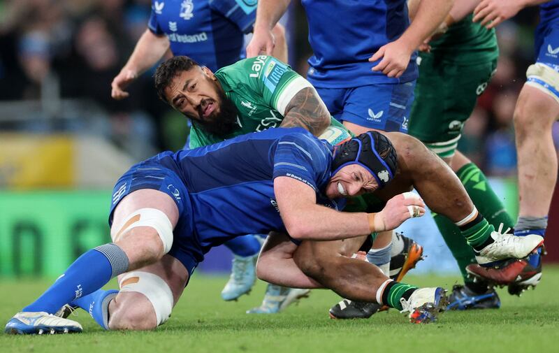 Leinster’s Ryan Baird tackles Connacht's Bundee Aki during the pre-Christmas clash at the Aviva Stadium. Photograph: James Crombie/Inpho 