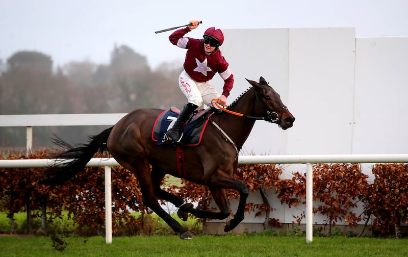 Sam Ewing onboard Brighterdaysahead celebrates winning the Neville Hotels Hurdle. Photograph: Ryan Byrne/Inpho