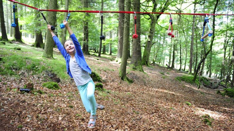 Freya Leonard has fun with the Trail Kids group in Cruagh Woods in the Dublin mountains. Photograph: Aidan Crawley