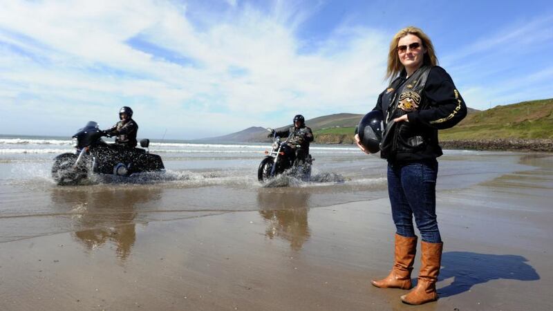 Castleisland Bikers Aine Connell and her dad Mike and friend Alan Collins from the Celtic Thunder Motor Cycle Club pictured on Inch Beach 
Photograph: Don MacMonagle