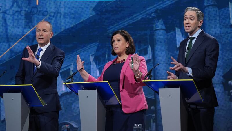 Micheal Martin, Mary Lou McDonald and Simon Harris during the final TV leaders' debate, at RTE studios in Donnybrook, Dublin. Photograph: Niall Carson/PA Wire