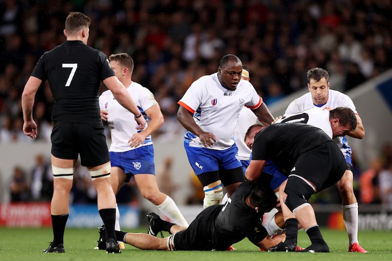 Adriaan Booysen of Namibia is tackled by Ethan de Groot of New Zealand, which later results in a red card for de Groot,  at Stadium de Toulouse on Friday. Photograph: Catherine Ivill/Getty Images