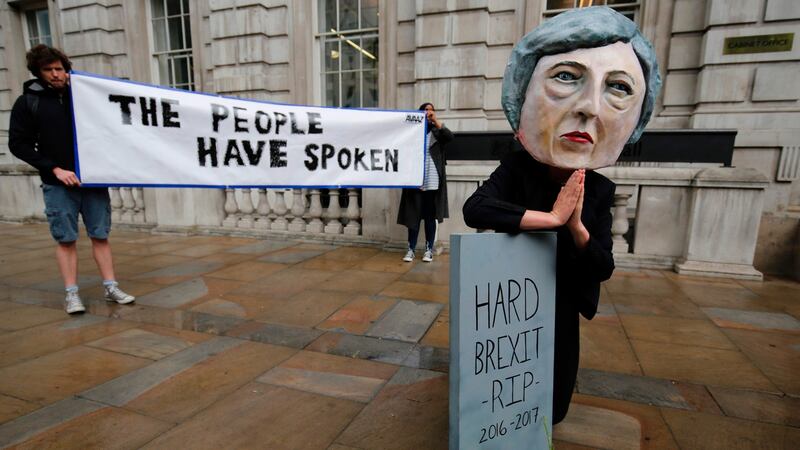 Hard Brexit RIP: a demonstrator predicts a softer UK departure from the European Union on Friday morning. Photograph: Adrian Dennis/AFP/Getty