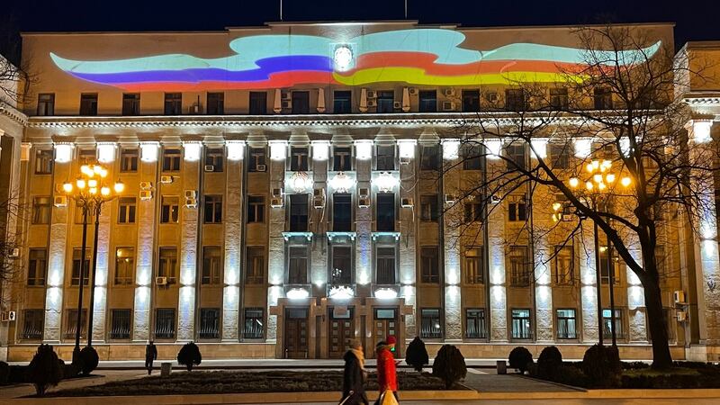 The flags of Russia and North Ossetia projected onto government headquarters in Vladikavkaz, capital of the republic of North Ossetia in southern Russia. Photograph: Daniel McLaughlin