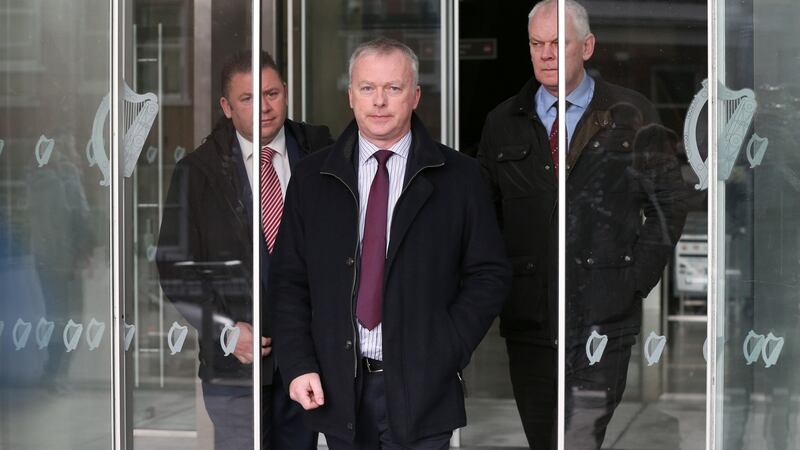 Det Supt Seamus Boland (centre) on his way to speak to the media outside the Special Criminal Court after Luke Wilson’s sentencing. Photograph: Collins Courts