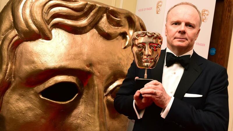 Jason Watkins with his Bafta award for his performance as the murder accused in ITV drama The Lost Honour of Christopher Jefferies. Photograph:  Ian West/PA Wire