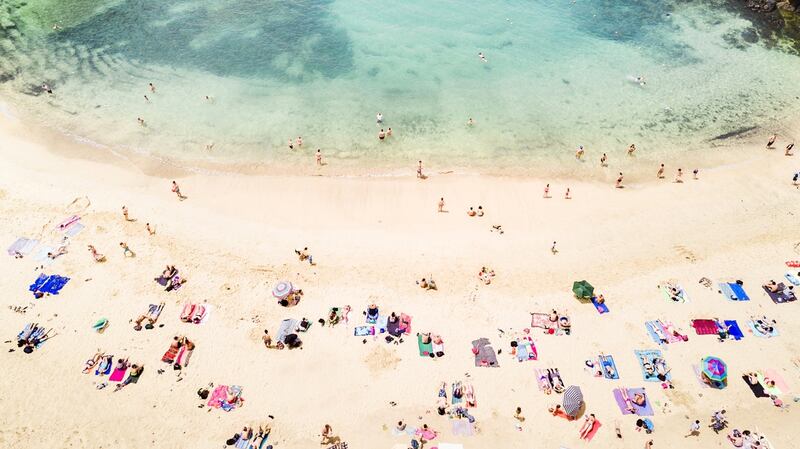 Aerial view of people at Papagayo beach in Lanzarote