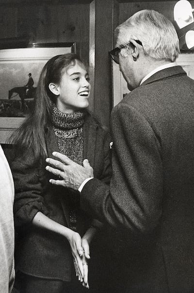 Jennifer Grant with her father during Ahmet Ertegun's Sunday Brunch at Fairfax Hotel in Washington, 1981. Photograph: Ron Galella via Getty Images