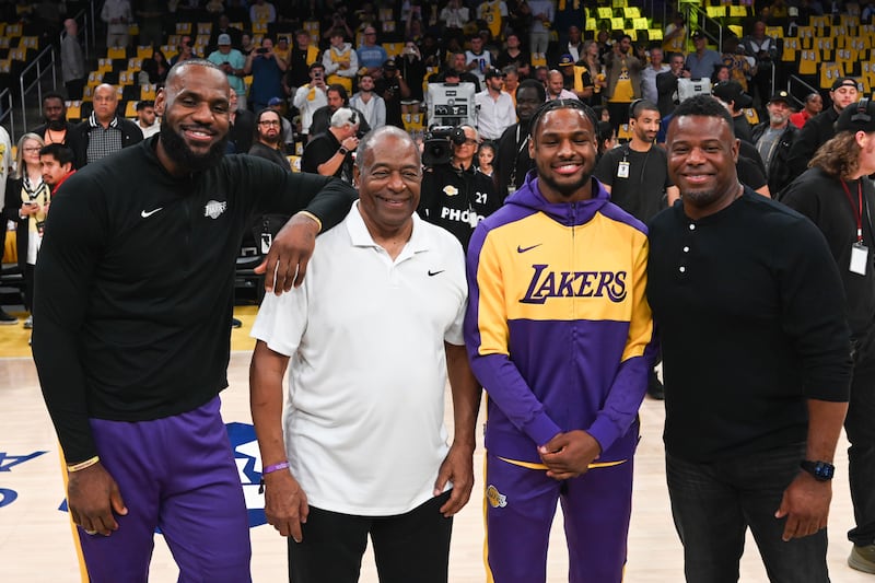 LeBron James, Ken Griffey, Bronny James and Ken Griffey Jr meet ahead of the LA Lakers v Minnesota. Bronny and Lebron James made history as the first father-son duo to play together in an NBA game - the Griffeys achieved the same feat in MLB. (Photograph: David Crane/MediaNews Group/Los Angeles Daily News via Getty Images