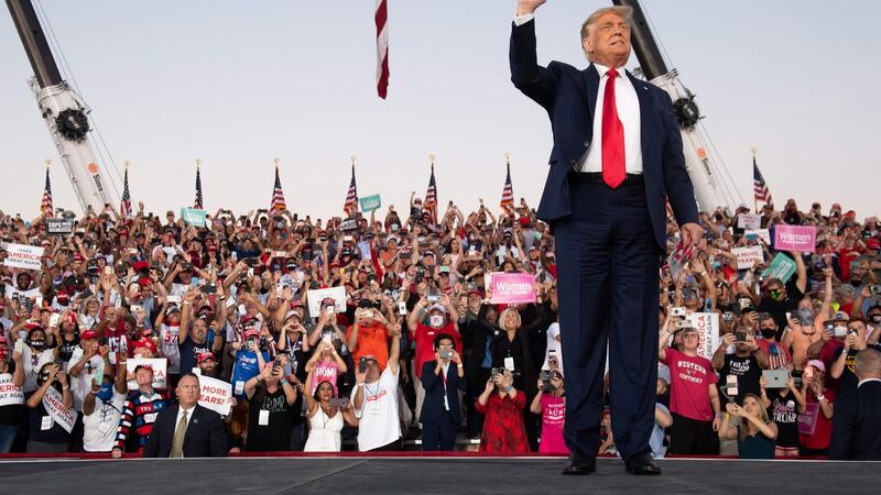 US president Donald Trump at Orlando Sanford International Airport: his behaviour has been criticised by Republican senator Mitt Romney and virus expert Dr Anthony Fauci. Photograph: Saul Loeb/AFP