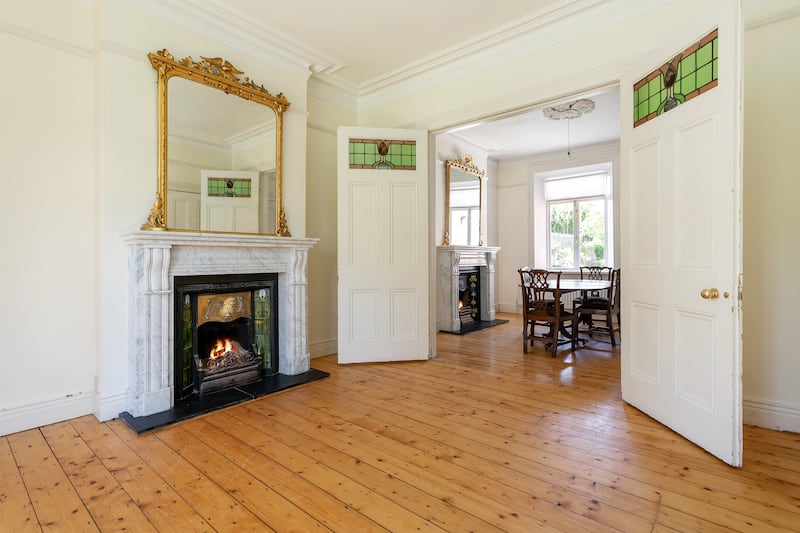 The property retains some lovely detaills such as marble fireplaces and stained glass