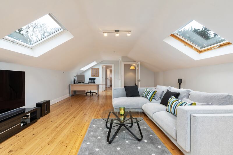 Part of the attic is laid out as a family room